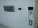Intercom, garage door button and security system