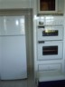 The fridge and oven and microwave