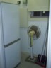 3rd fridge gets tucked away