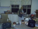 Mum sorts kitchen
