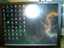 His laptop has a funky wallpaper.