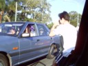 Kahless jumps out of our car while in traffic for a pic of other car.