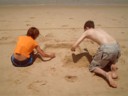 Lui and me making a sandcastle